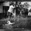 Mariah Driver plays Hide and Seek with her sisters outside her house on S. Chicago St. in Chicago's Pocket Town neighborhood.