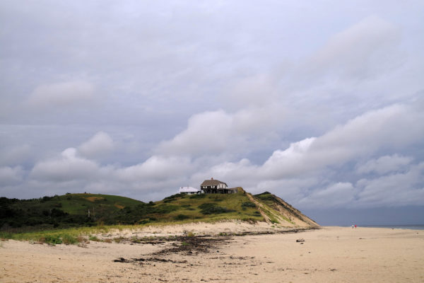 This home, depicted in 2016, eventually collapsed when the sand dune it was built on collapsed in 2019.